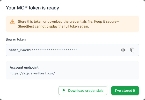 One-time MCP token dialog with the token masked and Download credentials available.